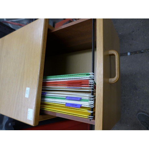 2216 - A three drawer wooden filing cabinet