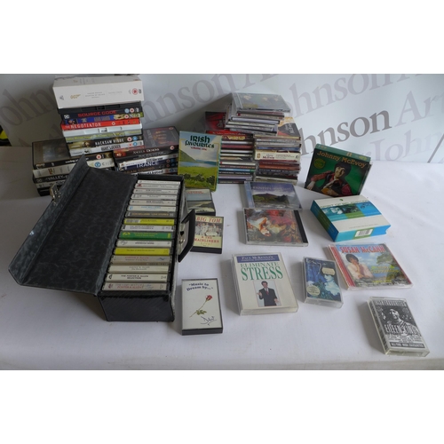 2225 - A box of assorted DVDs, CDs and tapes