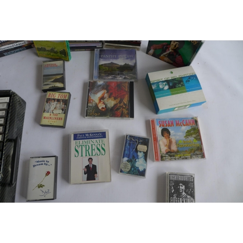 2225 - A box of assorted DVDs, CDs and tapes