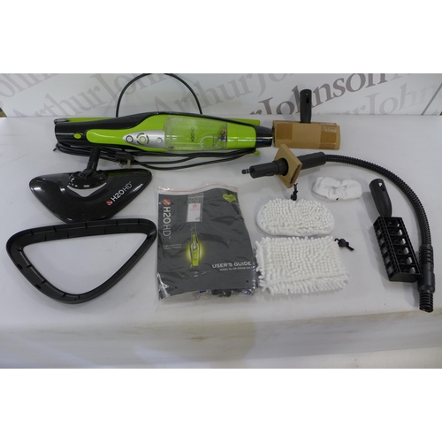 2233 - A H20 HD 5-in-1 High Definition steam cleaner with a box of cleaning attachments and accessories