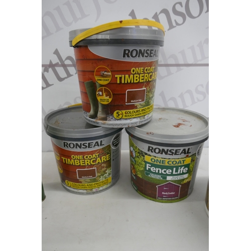 2292 - Two tubs of Ronseal medium oak one coat timbercare, a tin of Cuprinol natural UV guard decking oil, ... 