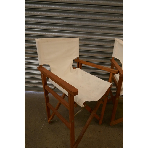 2300 - Three folding directors chairs