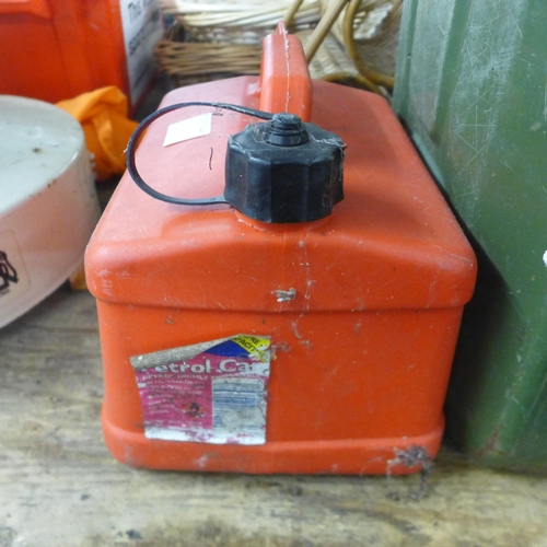 2325 - 4 jerry cans and one plastic petrol can