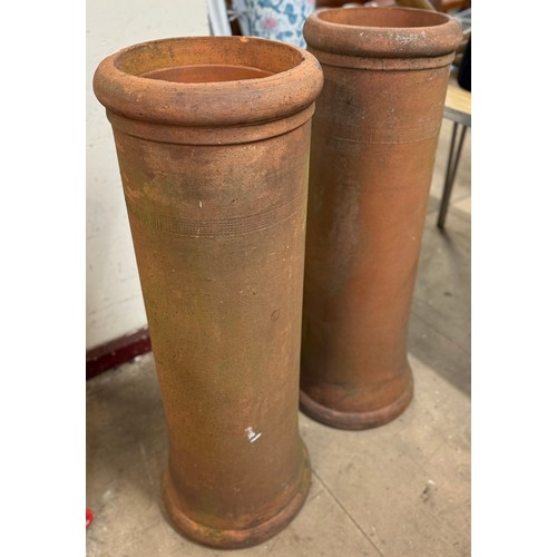 322 - A pair of terracotta chimney-pots