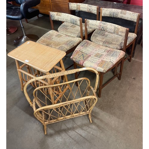 112 - A set of four teak dining chairs and two bamboo magazine racks