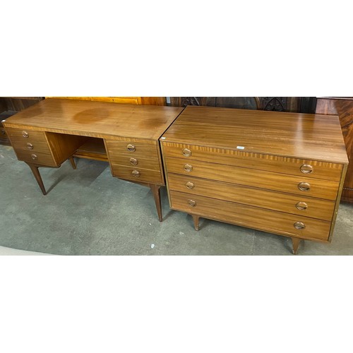 115 - A Butilux teak chest of drawers and dressing table