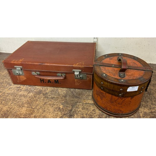 383 - A leather stationery case, a circular box and a brass fireside companion set