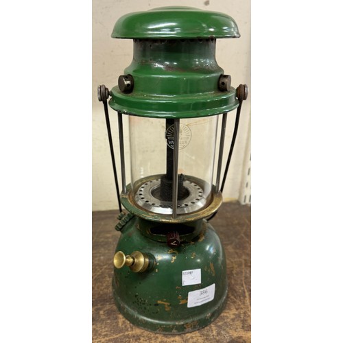 386 - An green metal Tilley lamp