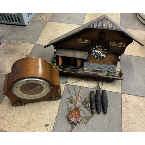 387 - An Art Deco walnut mantel clock and a cuckoo clock