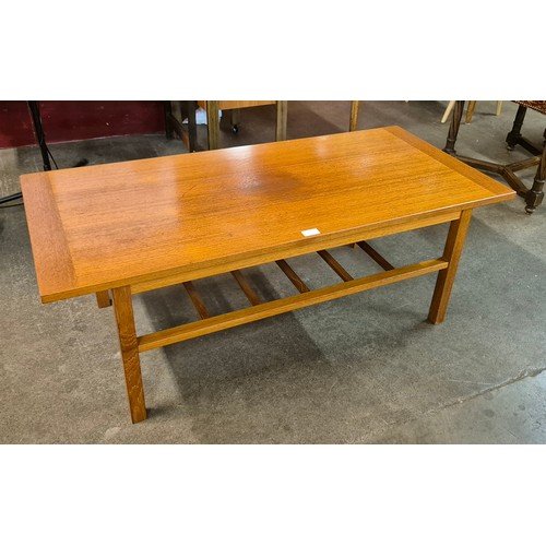 114 - A teak coffee table