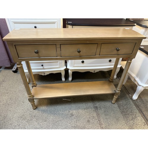 1464 - A three drawer console table