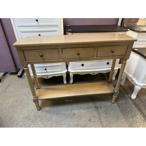 1464 - A three drawer console table