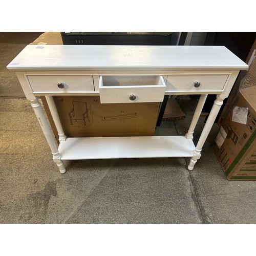 1477 - A white three drawer wooden console table