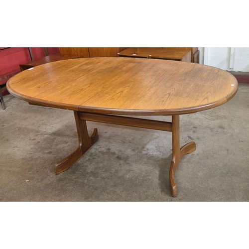 8 - A G-Plan Fresco oval teak extending dining table