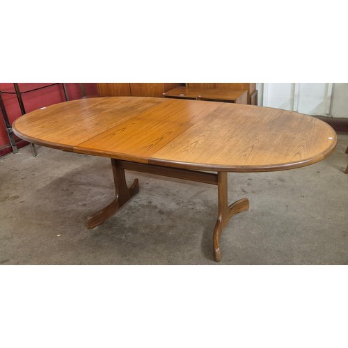 8 - A G-Plan Fresco oval teak extending dining table