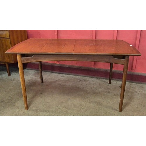 11 - A G-Plan Brasilia teak extending dining table