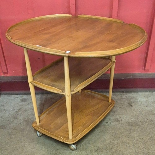 14 - An Ercol Blonde elm and beech drop leaf trolley