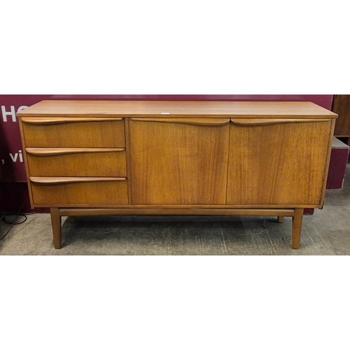 20 - A teak sideboard