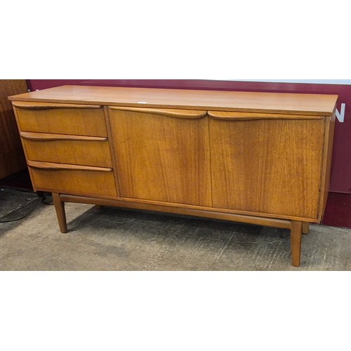 20 - A teak sideboard