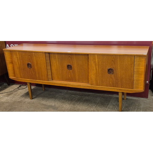 25 - A teak sideboard