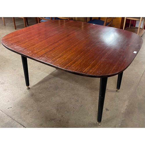 21 - A G-Plan Librenza tola wood and black extending dining table