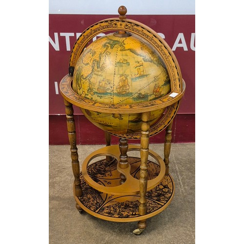 40 - An Italian style terrestrial globe cocktail cabinet/trolley