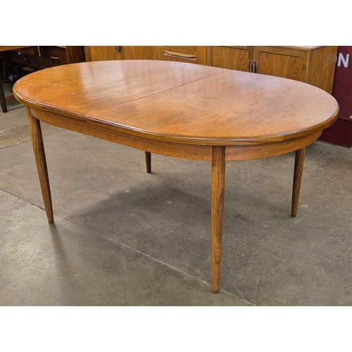 25B - A G-Plan Fresco teak oval extending dining table