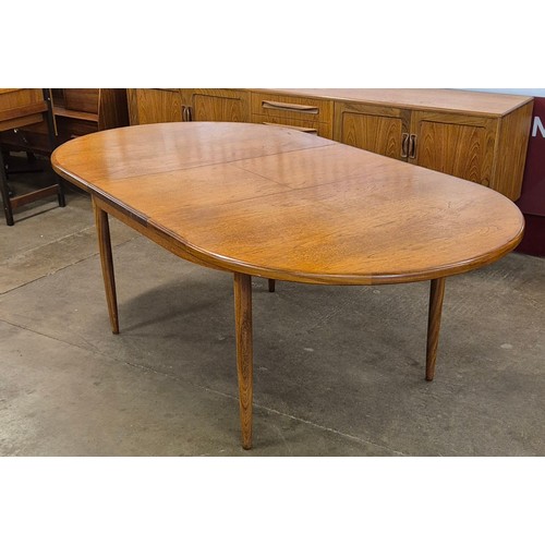 25B - A G-Plan Fresco teak oval extending dining table