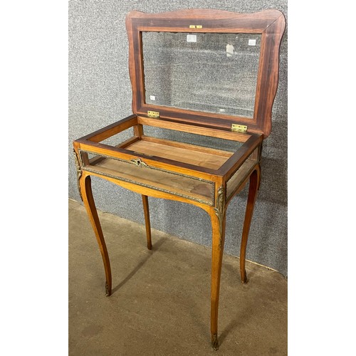 106 - A 19th Century French inlaid walnut and ormolu mounted bijouterie table