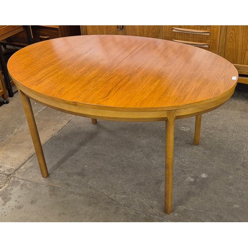 46 - A White & Newton teak oval extending dining table