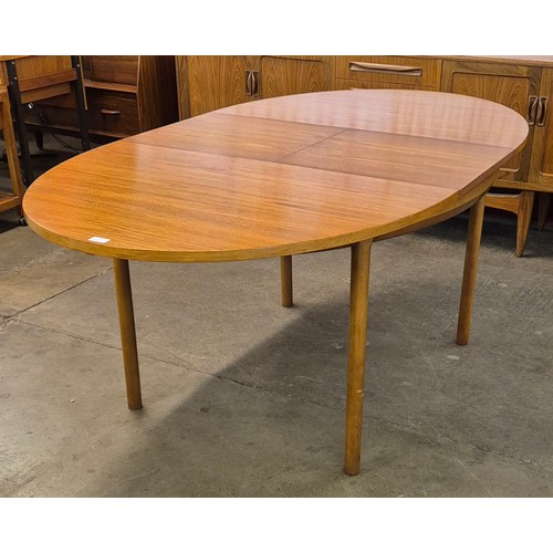 46 - A White & Newton teak oval extending dining table