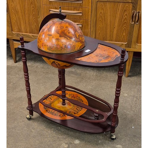 48 - An Italian style terrestrial globe cocktail trolley/cabinet