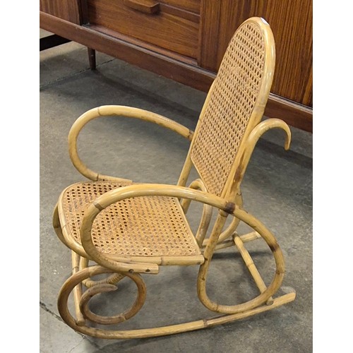 56B - A small Italian style bamboo bergère rocking chair