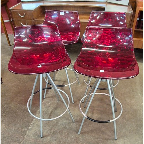 59 - A set of four Italian Calligaris Ice red perspex and tubular metal bar stools