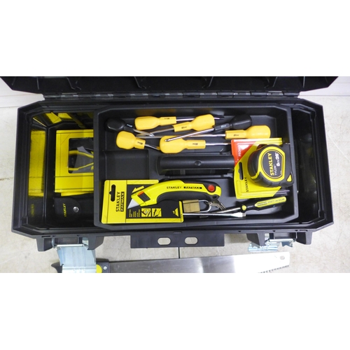 5019 - A metal reinforced Stanley box including a 8 metre Stanley tape measure, a Fatmax Stanley knife, 2 S... 