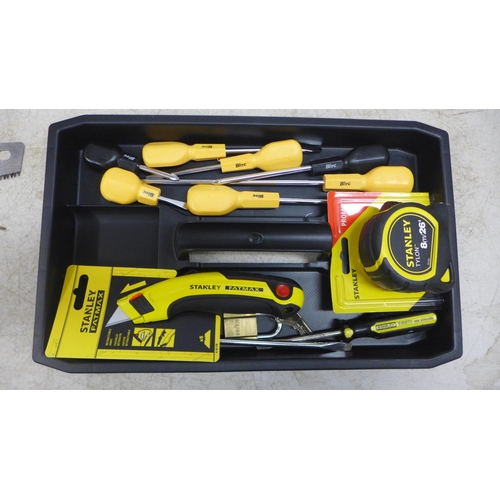 5019 - A metal reinforced Stanley box including a 8 metre Stanley tape measure, a Fatmax Stanley knife, 2 S... 