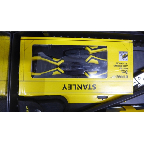 5019 - A metal reinforced Stanley box including a 8 metre Stanley tape measure, a Fatmax Stanley knife, 2 S... 