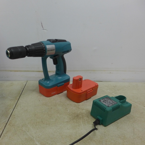 5036 - A Bachmayer BM24V, 24V cordless drill in case with two batteries and charger