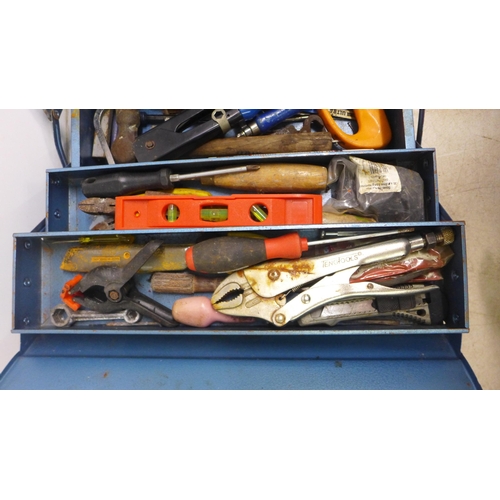 5043 - A blue metal cantilever toolbox and an assortment of hand tools including screwdrivers, spirit level... 