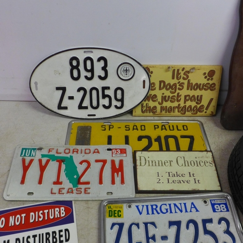 5062 - A large quantity of assorted plaques and signs including number plates, Marilyn Monroe, a stainless ... 