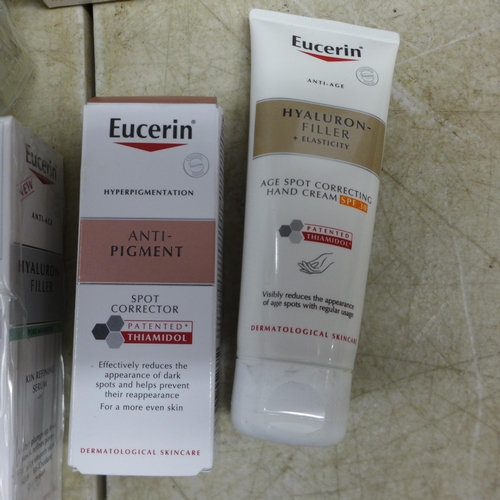 5064 - A box of assorted cosmetics including Eucerin Dermo Purifyer Oil Control Scrub and Eucerin Hyaluron-... 