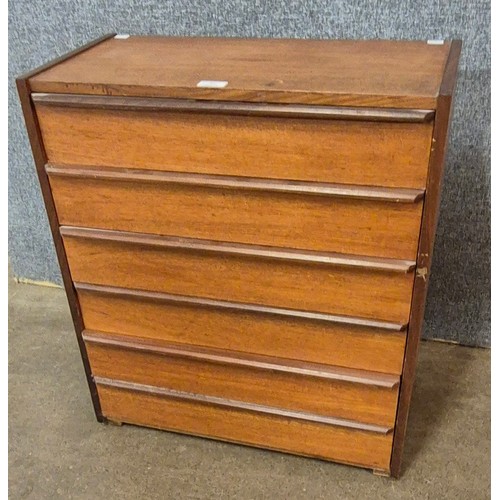 67 - A small teak chest of drawers