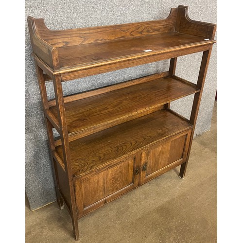 114 - A Liberty & Co. style oak open bookcase