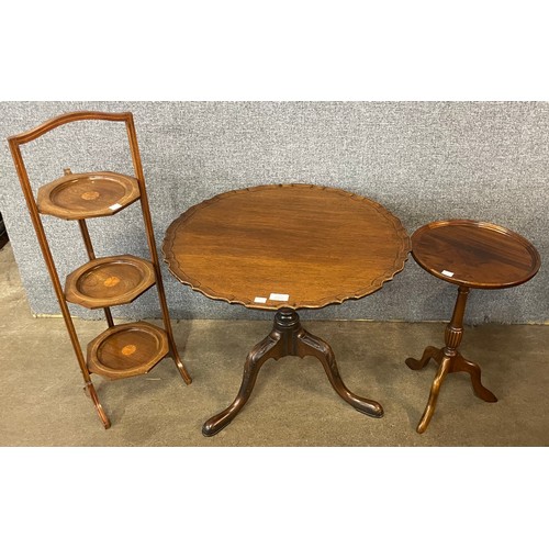 121 - A George III style mahogany tripod occasional table, an inlaid mahogany cakestand and a mahogany tri... 