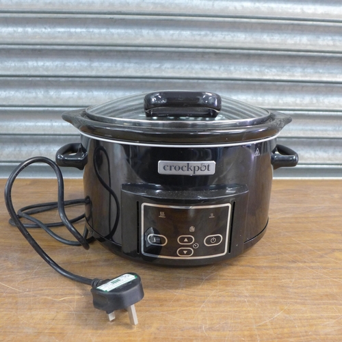 A CrockPot slow cooker and a Daewoo soup kettle