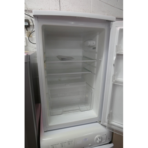 5113 - A Bush M5085UCL under counter free standing fridge