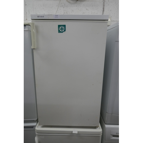 5120 - An Indesit GR1403 free standing under counter fridge