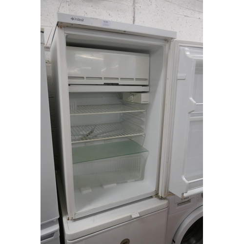 5120 - An Indesit GR1403 free standing under counter fridge