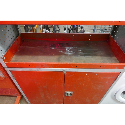 5137 - A large red metal BOTT In-Vehicle Equipment two door tool cabinet