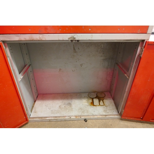 5137 - A large red metal BOTT In-Vehicle Equipment two door tool cabinet